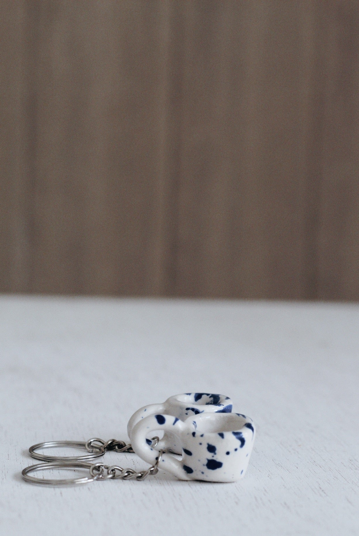 Llaveros, mini tazas
